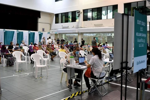 Singapore expands COVID-19 vaccination to residents aged 45-59