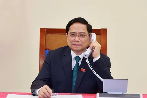 Lao Prime Minister makes phone call to congratulate Vietnamese counterpart