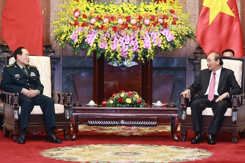 Armies’ successful ties help reinforce Vietnam-China relations: President