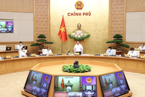 Prime Minister Pham Minh Chinh addresses Government meeting (Photo: VNA)
