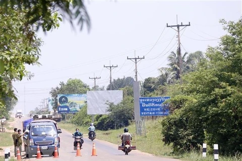 COVID-19 control measures remain in Laos, Cambodia shuts down factories