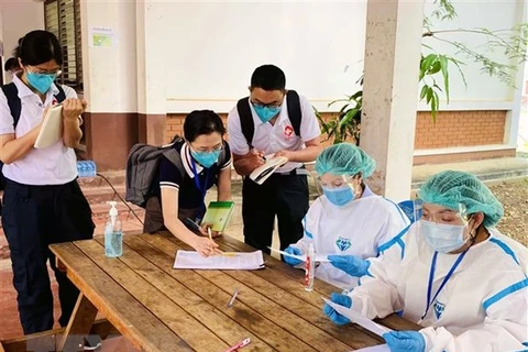Laos applies compulsory quarantine to people having close contact with COVID-19 patients