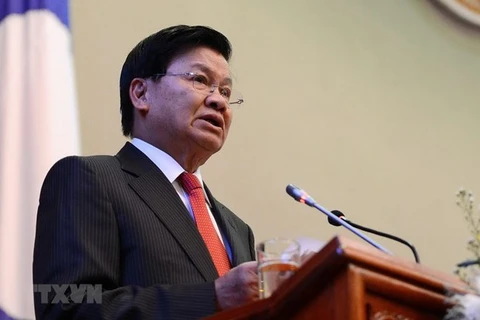 Lao leader’s Vietnam visit contributes to tightening bilateral relations