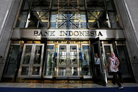 Indonesia lowers economic growth forecast for 2021