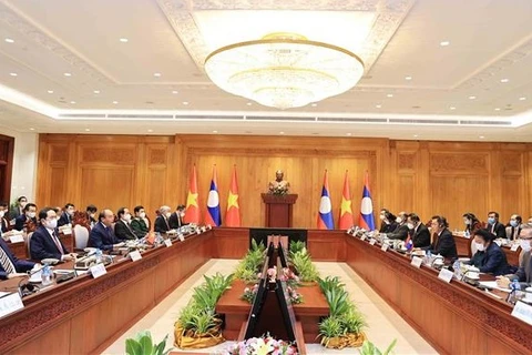 Vietnamese President Nguyen Xuan Phuc meets with Chairman of Lao NA