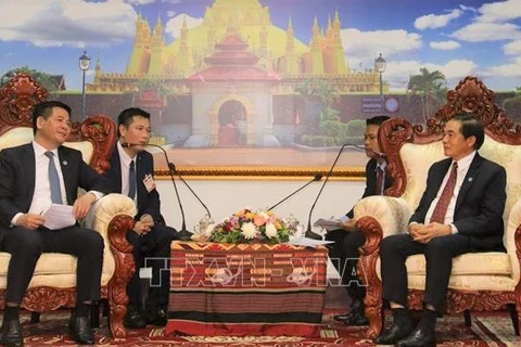 Vietnam, Laos seek to beef up trade, industry and justice ties