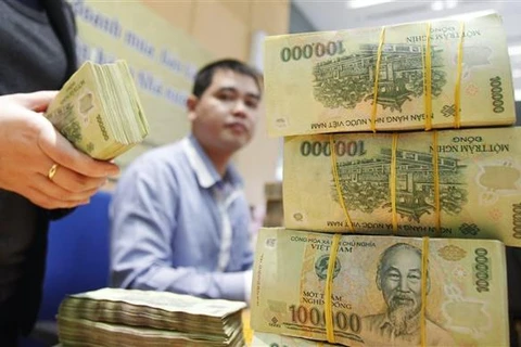 Reference exchange rate down 26 VND on August 12