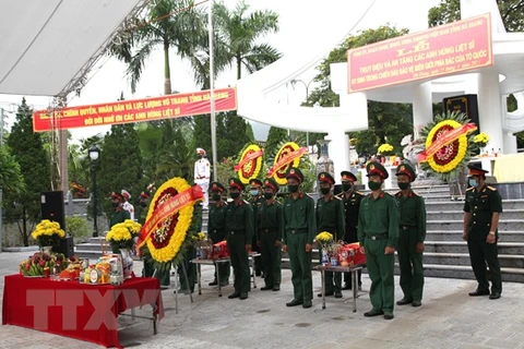  Reburial service held for fallen combatants in Ha Giang province