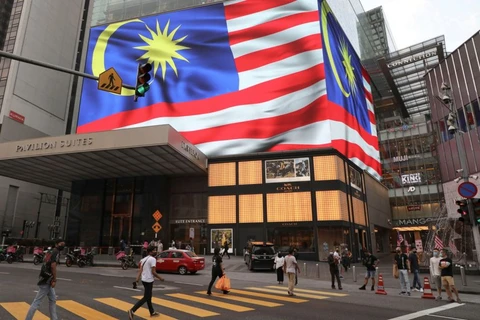 Malaysia allows 11 business sectors to reopen