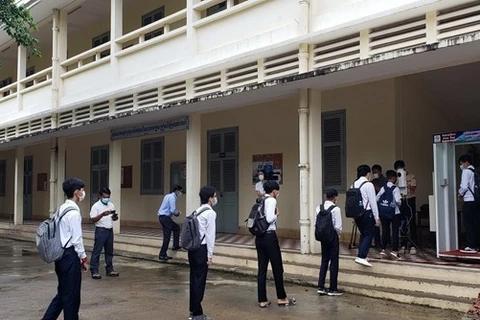 Cambodian students return to school on September 15