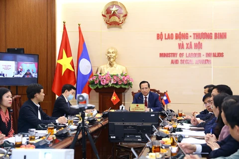 Vietnam, Laos talk enhancement of labour, social welfare cooperation