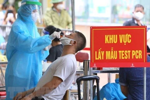 Vietnam reports additional 14,835 COVID-19 cases