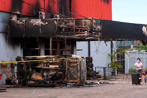 Indonesia: 19 killed in clash, fire at night club