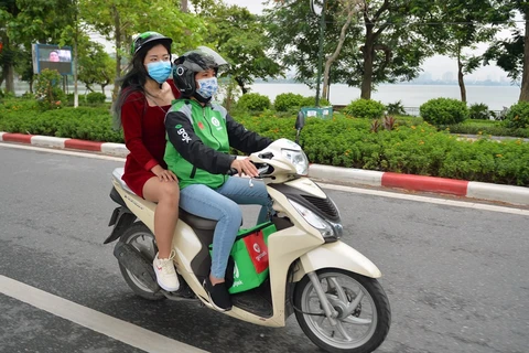 Motorbike taxi services returns in Hanoi