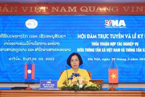 Vietnamese, Lao news agencies intensify cooperation