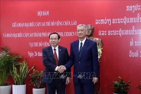 HCM City, Lao capital step up cooperation