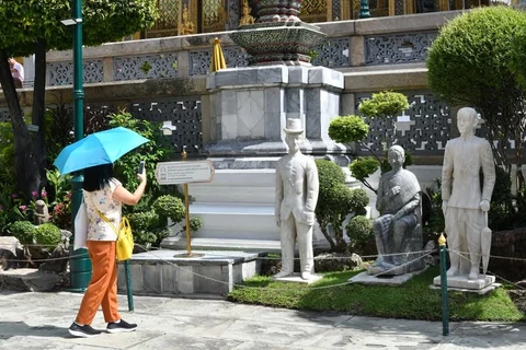Thailand: Century-old stone sculptures displayed at Emerald Buddha Temple