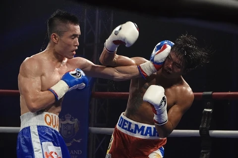 Quan defends title, heads to world level