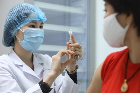 HCM City: More COVID-19 cases detected, vaccination ramped up