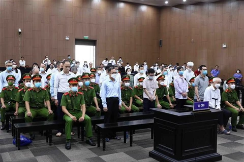 Trial opens for 13 former leaders of Binh Duong province in land-use rule violation case