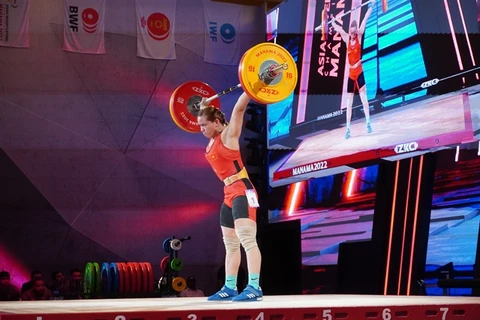 Lifter Thanh dominates Asian weightlifting championships