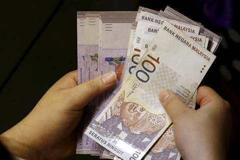 Malaysia’s ringgit marks new all-time low