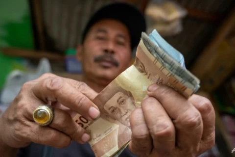 Indonesia’s central bank raises rates again to curb inflation