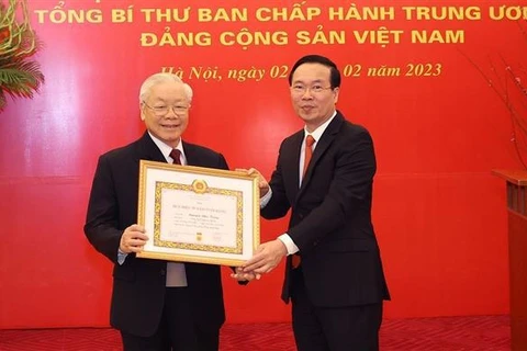 Party chief receives 55-year Party membership badge