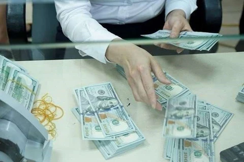 Reference exchange rate down 1 VND on March 10