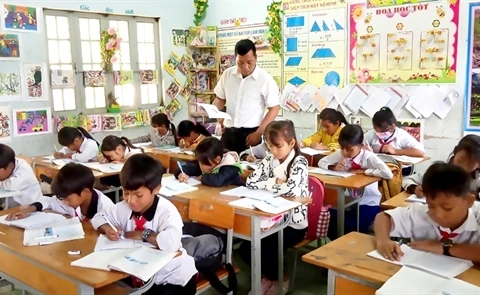 Village teacher helps ethnic students keep going to school