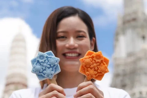 Tourists dazzled by ice cream inspired by Thai temple tiles