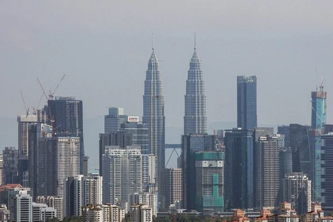 Malaysia’s GDP growth eases in Q2