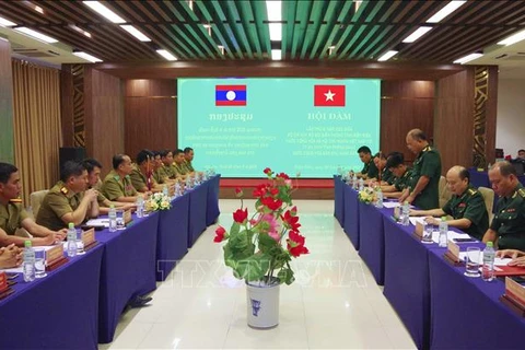 Vietnamese, Lao provinces foster ties in border management