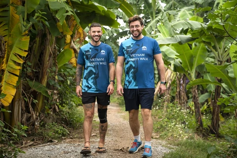 Two expats complete 2,000-km walk to raise funds for Vietnamese underprivileged children
