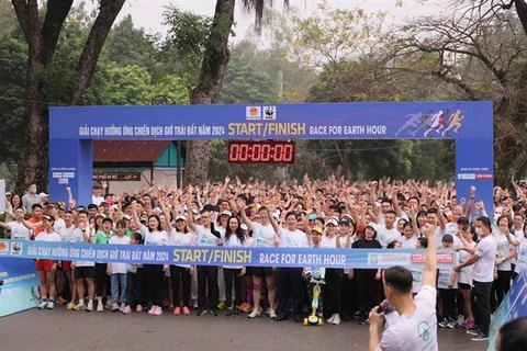 People run to respond to Earth Hour 2024 Campaign