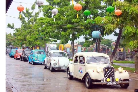 Parade of classic cars in Hoi An ancient town