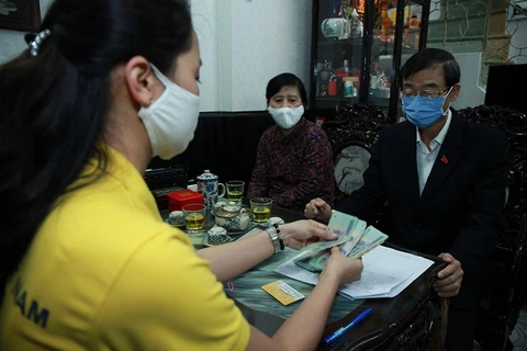 More than 440,000 people in Hanoi receive pension, allowance at home