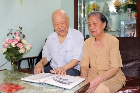 Old couple’s honour when serving Uncle Ho