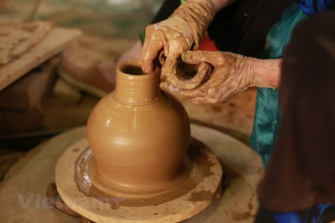 Shades of clay in Huong Canh ancient pottery village in Vinh Phuc