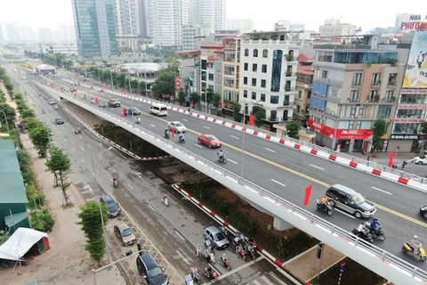 Admiring the largest flyover in Hanoi which has just opened to traffic