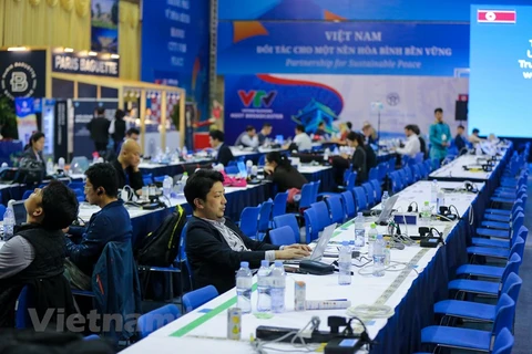 Reporters up all night at summit media centre