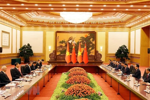 Vietnamese President meets Chinese party and state leader