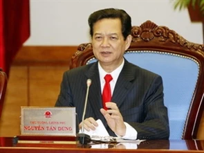 PM Nguyen Tan Dung at the online conference (Source: VNA)