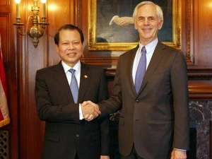 Deputy Prime Minister Vu Van Ninh and US Secretary of Commerce John Bryson (Source:VNA)