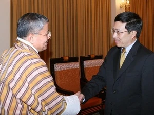 Foreign Minister Pham Binh Minh receives Lyonpo Kinzang Dorji (Source: VNA)