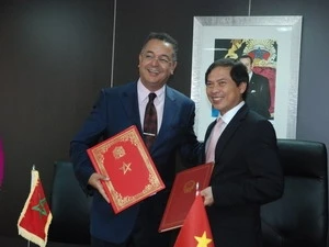 Moroccan Minister of Industry and Trade and Vietnamese Deputy Foreign Miniser (Source:VNA)