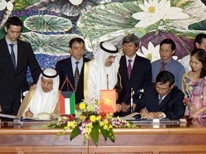 The signing ceremony (Source: VNA)