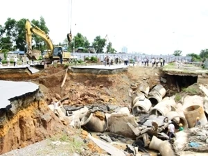 The collapse of part of the road in Hanoi’s Le Van Luong Street (Source: VNA)