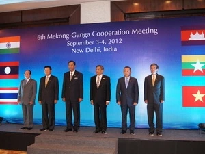 Participants at the meeting (Source: VNA)