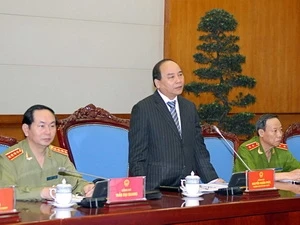 Deputy Prime Minister Nguyen Xuan Phuc addresses the teleconference. Photo: VNA